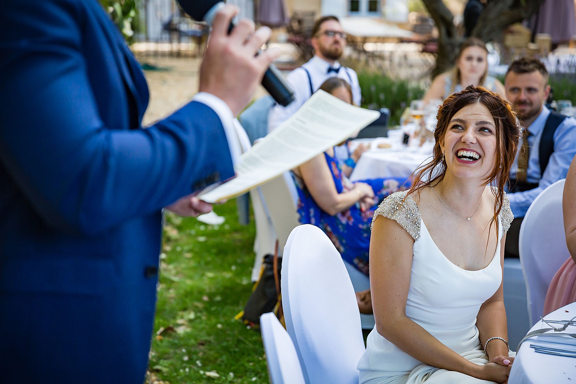 bride laughs at speech