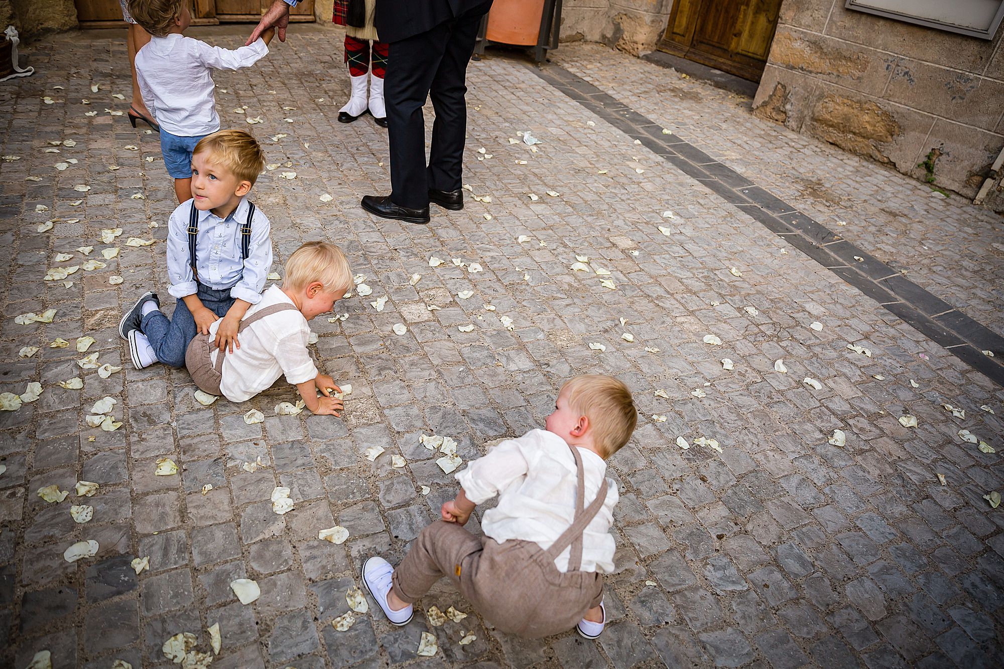 kids gather up confetti